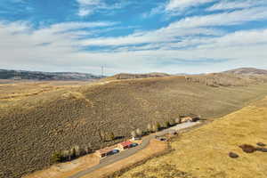 Aerial view featuring a mountain view and a rural view