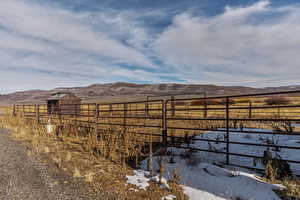 View of yard featuring a mountain view and a rural view