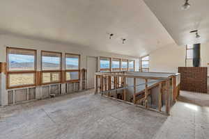 Miscellaneous room with vaulted ceiling