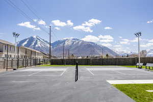 View of sport court with basketball court and a mountain view