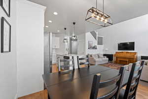 Dining room featuring sink and light hardwood / wood-style floors