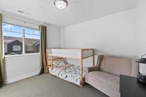 View of carpeted bedroom