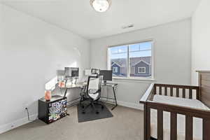 Bedroom featuring carpet floors