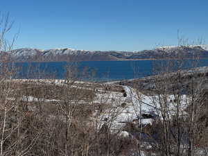 Property view of water with a mountain view