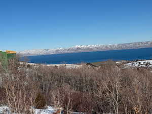 Property view of water with a mountain view