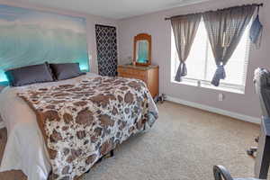 View of carpeted bedroom