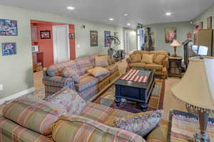 Living room with carpet floors