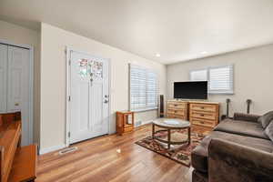 Living room featuring light hardwood / wood-style flooring