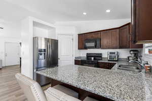 Kitchen with corner pantry