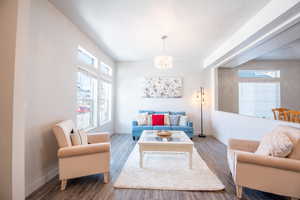 Living room featuring hardwood / wood-style flooring