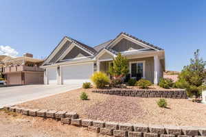 Craftsman-style home featuring a garage