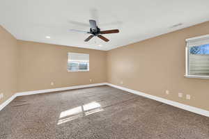 Bedroom with carpet flooring and ceiling fan