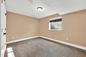 Bedroom with carpet flooring