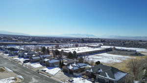 Snowy aerial view with a mountain view