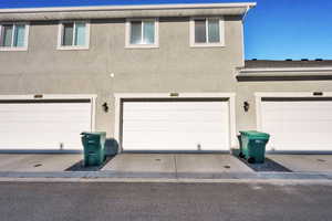 View of front of property featuring a garage