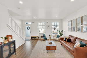 Living room featuring hardwood / wood-style flooring