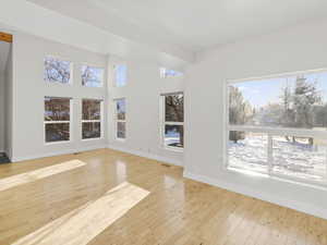 Interior space with plenty of natural light and light wood-type flooring