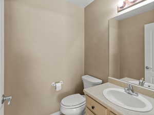 Bathroom with vanity and toilet