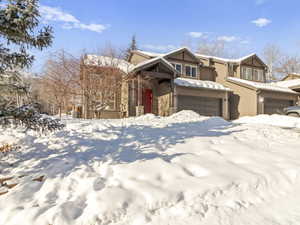 View of front of home featuring a garage