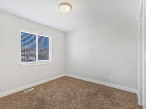 View of carpeted empty room