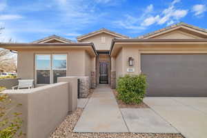 View of front of property with a garage