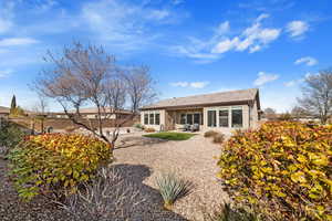 Rear view of property featuring a patio