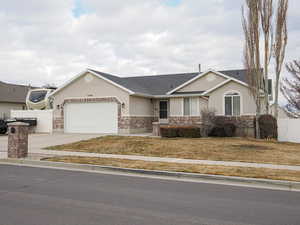 Single story home featuring a garage