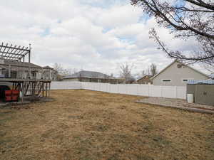 View of yard with a pergola