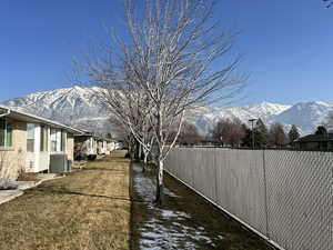 Exterior space featuring cooling unit and a mountain view