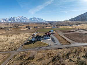 Birds eye view of property featuring a mountain view and a rural view