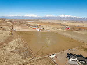 Drone / aerial view with a mountain view and a rural view