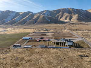 Property view of mountains with a rural view