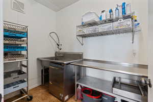 Kitchen featuring stainless steel counters