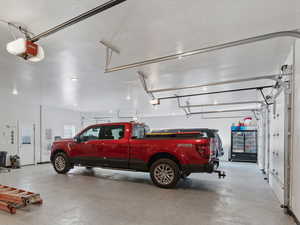 Garage featuring a garage door opener