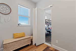 Interior space with hardwood / wood-style flooring