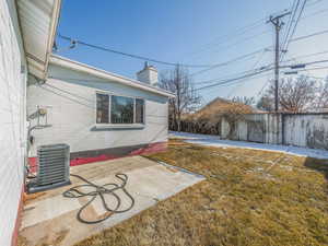 View of yard featuring a patio and central air condition unit