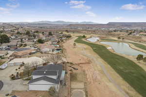 Bird's eye view featuring a water and mountain view