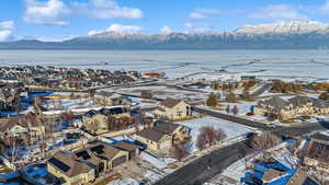 Snowy aerial view featuring Utah Lake and mountain views