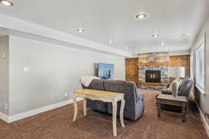 basement family room with fireplace, wet bar and walk-out