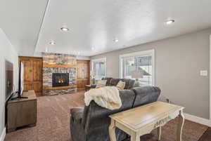 basement family room with fireplace, wet bar and walk-out