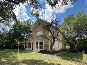 View of home's exterior with a lawn