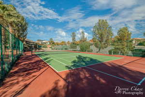 View of tennis court featuring basketball court