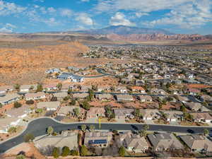 Birds eye view of property featuring a mountain view