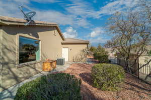 Exterior space featuring central AC unit and a patio