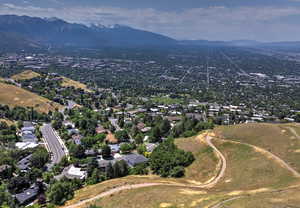 Birds eye view of property with a mountain view