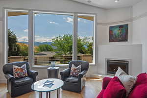 Interior space featuring a mountain view and light hardwood / wood-style flooring