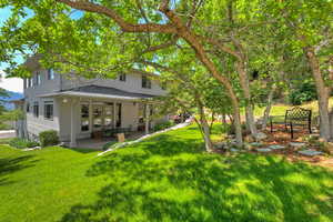 View of yard with a patio