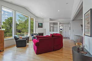 Living room with light wood-type flooring