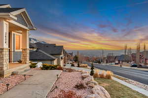 View of property front exterior at dusk