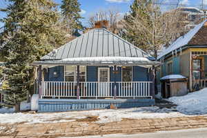 View of front of property with a porch